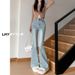 2025 New Guangzhou Xintang Washed Blue Micro Flare Jeans For Women, High Waist, Slimming, Height-Enhancing, Cotton_ecoleips.com