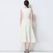 Elegant V-Neck Sleeveless Cocktail Dress With Oversized Bow & Cinched Waist – Flowing Skirt & Belt Included_ecoleips.com