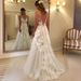 Elegant Off-Shoulder Deep V-Neck Lace Wedding Dress With Slim Fit & Cathedral Train – Available In White & Ivory_ecoleips.com