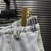Vintage Wash Denim A-Line Puff Skirt Multi-Pocket Distressed Light Blue Mini Skirt for Street Style Women's Bottoms_ecoleips.com