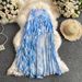 Ethereal Resort Maxi Skirt With Asymmetric Hem, Flowing Ribbon Ties, And Ruffle Detail, Dopamine-Inspired Ombre Dye For Women_ecoleips.com