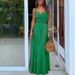 2026 Summer New European And American Women's Fashion Unique Button V-neck Spliced Strap Dress_ecoleips.com