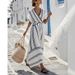2026 New European And American Summer Vacation V-neck Women's Short Sleeve Pleated Flared Dress_ecoleips.com