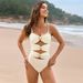 2025 new style swimsuit solid color splicing hot style metal button swimsuit European and American cross border one piece swimsuit_ecoleips.com