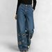 High-Waisted Loose-Fitting Cutout Jeans Metallic Eyelets Hollowed out Detail Wholesale Denim Trousers_ecoleips.com