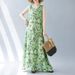 Real Shot Of The 2024 Summer New Bohemian Plus-size Sleeveless Round-neck Printed Mid-length Dress For Women_ecoleips.com