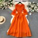 Women's design tassel V-neck slim long heavy-duty pleated trumpet sleeve dress for women_ecoleips.com