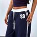 AC790 Spring And Autumn New High-Waisted Loose Straight Casual Sports Sweatpants With Striped Splicing Wide-Leg Design_ecoleips.com