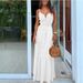 2026 Summer New European And American Women's Fashion Unique Button V-neck Spliced Strap Dress_ecoleips.com