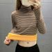 This Autumn And Winter Korean-Style Thickened High-Neck Base Layer Shirt Is Warm And Pairs Well With A Striped T-Shirt._ecoleips.com