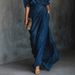 2025 Independent Website European And American Women's Autumn Elegant And Sexy Solid Color Irregular Pleated Pocket Long Skirt_ecoleips.com