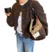 A Casual Yet Elegant Long-Sleeved Jacket With Simple Buttons, Paired With A Relaxed Yet Stylish Sweater In A Retro-Chic_ecoleips.com