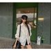 Stylish White Shirt With Notched Collar, Puff Sleeves, A Cinched Waist For Early Autumn. Fashionable, Casual, And_ecoleips.com