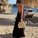 Women's Clothing Women's Summer New Solid Color Sling Loose Medium Length Beach Vacation Dress_ecoleips.com