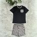 European And American Cross-border Women's Clothing, New Summer Fashion Printed Round-neck Pocket Short-sleeve Shorts_ecoleips.com