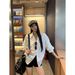 Stylish White Shirt With Notched Collar, Puff Sleeves, A Cinched Waist For Early Autumn. Fashionable, Casual, And_ecoleips.com
