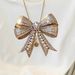 Women's Slim Fit T-Shirt Summer Style European American Bow Pearl Print round Neck Short Sleeve Casual Elegant Fashion_ecoleips.com