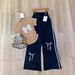 Korean Style Women's Summer Fashion Bow Print Two Piece Set Short Sleeved Loose Wide Leg Pants Casual Outfit For Ladies_ecoleips.com