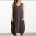 A Large-Sized Loose Cotton And Linen Sleeveless Dress In Solid Color Pocket Midi Dress_ecoleips.com
