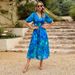 Summer Dress With A Fitted Waistline, Deep V-Neck, And Printed Design_ecoleips.com