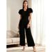 2026 Summer New Pure Black Lotus Leaf Sleeve Jumpsuit Women's V-neck Pleated Waist Wide Legs Elegant Commuter Jumpsuit_ecoleips.com