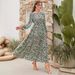 2023 Autumn European And American Cross-Border Floral Print Casual Outdoor Round Neck Long Sleeve Elegant Dress_ecoleips.com
