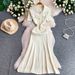 Elegant Pearl Button Detail Knitted Long Dress for Women Gentle Fit Slim Fit Pleated New Style 2026_ecoleips.com