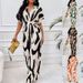 Women's Clothing Spring And Summer New Products Full Body Printed Bat Sleeve Wide Leg Jumpsuit_ecoleips.com