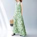 Real Shot Of The 2024 Summer New Bohemian Plus-size Sleeveless Round-neck Printed Mid-length Dress For Women_ecoleips.com