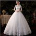 French Retro Wedding Dresses Off-Shoulder Long Sleeved Tulle Gowns Floor Length Simple Style New_ecoleips.com