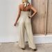 K New Simple Vacation Slimming Over-the-shoulder Solid Wide-leg Bodysuit_ecoleips.com