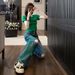 2026 Trendy Personalized Ripped Jeans Women's Green Top Two-Piece Set LC1030_ecoleips.com
