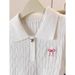 Women's White Polo Collar Knit Top Short Sleeve Shirt with Bow Embroidery And Button Detail Summer 2025_ecoleips.com