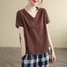 The Korean-Style Loose Top Is A Trendy Summer Short-Sleeved Garment With A V-Neck Design, Featuring Stylish Labels And P_ecoleips.com
