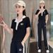 Women's Stylish Lapel Short Sleeve Sports Suit Chic And Youthful Professional Two Piece Set Summer 2026 New Style_ecoleips.com