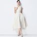 Elegant V-Neck Sleeveless Cocktail Dress With Oversized Bow & Cinched Waist – Flowing Skirt & Belt Included_ecoleips.com