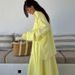 2025 Fashion Yellow Loose Long Sleeve Shirt + High Waist Skirt Set For Women_ecoleips.com