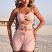 Women's Slim Fit One Piece Swimsuit 2026 European And American Fashion Sexy Solid Color with Metallic Accessories_ecoleips.com