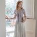 2026 New Korean Shawl Collar Lace-up T-shirt Female Slim Design Summer Short-sleeved Temperament Versatile Commuter Top_ecoleips.com