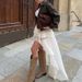 Elegant Casual Women's Irregular Hem Midi Skirt Elastic Waist A-Line Thin Summer Pleated Mid-Calf Casual England Style_ecoleips.com