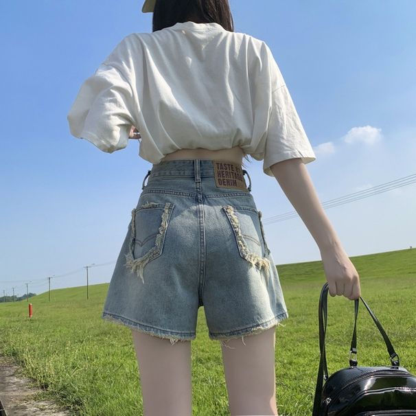 2025s Women's Summer New Versatile Slimming High-Waisted Hip-Hugging Loose Frayed A-Line Hot Pants_ecoleips.com