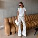 Jacquard Bell Bottom Pants European And American 2025 Spring And Summer New Women's Jacquard Lace Flower Hollow Slim Flared Pants_ecoleips.com