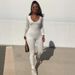 Sexy Long Sleeved Jumpsuit European And American Design Irregular Low Cut Solid Color Temperament Top for Women Fashionable_ecoleips.com
