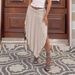 2025 New Spring Summer Casual Women's Pleated Side Slit Irregular Hem Skirt_ecoleips.com