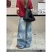 ICC Early Spring New Street Style Loose Fit Curved Hem Jeans With Washed Fading And Cat-Eye Effect For Women 10663_ecoleips.com