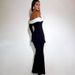 European American New Women's Fashion Color-blocking Off-shoulder Slim-fit Long-sleeve Long-sleeved Fish-tail Dress With A Sophisticated Silhouette
_ecoleips.com