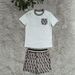 European And American Cross-border Women's Clothing, New Summer Fashion Printed Round-neck Pocket Short-sleeve Shorts_ecoleips.com