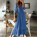 2025 European American Summer New Fashion Women's V-neck Long Dress With Waist-Cinching Floral Print And Flared Hem_ecoleips.com