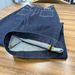 2026 Early Spring New European And American FD Style High-waisted Dark Blue Front Pocket Denim Flared Pants For Women_ecoleips.com
