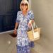 2025 New Plus Size Fairy V-neck Floral Beach Vacation Loose Versatile Long Dress_ecoleips.com